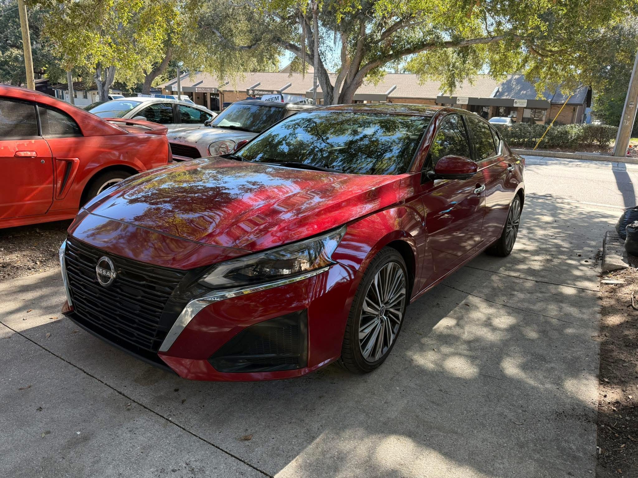 Red Nissan Altima Tint